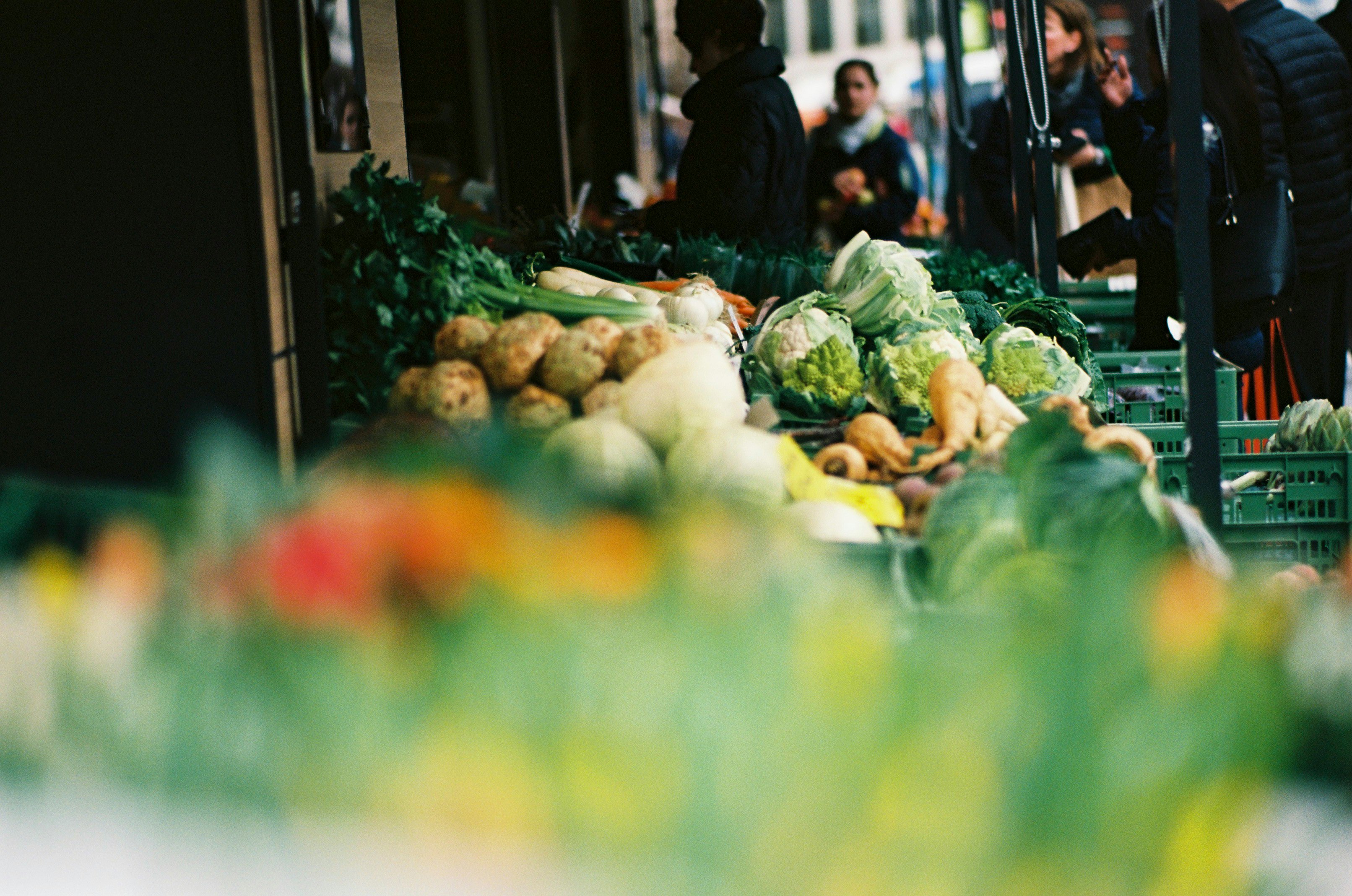 green vegetable on display in tilt shift lens